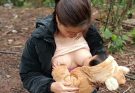 Beautiful young single mother breastfeeding, lovely, heartbroken